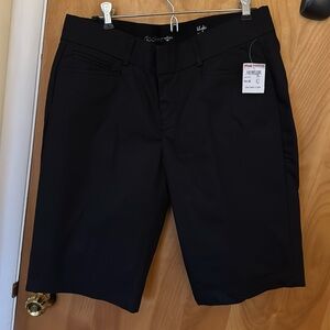 SZ 10 NWT Dockers long shorts in the color black.